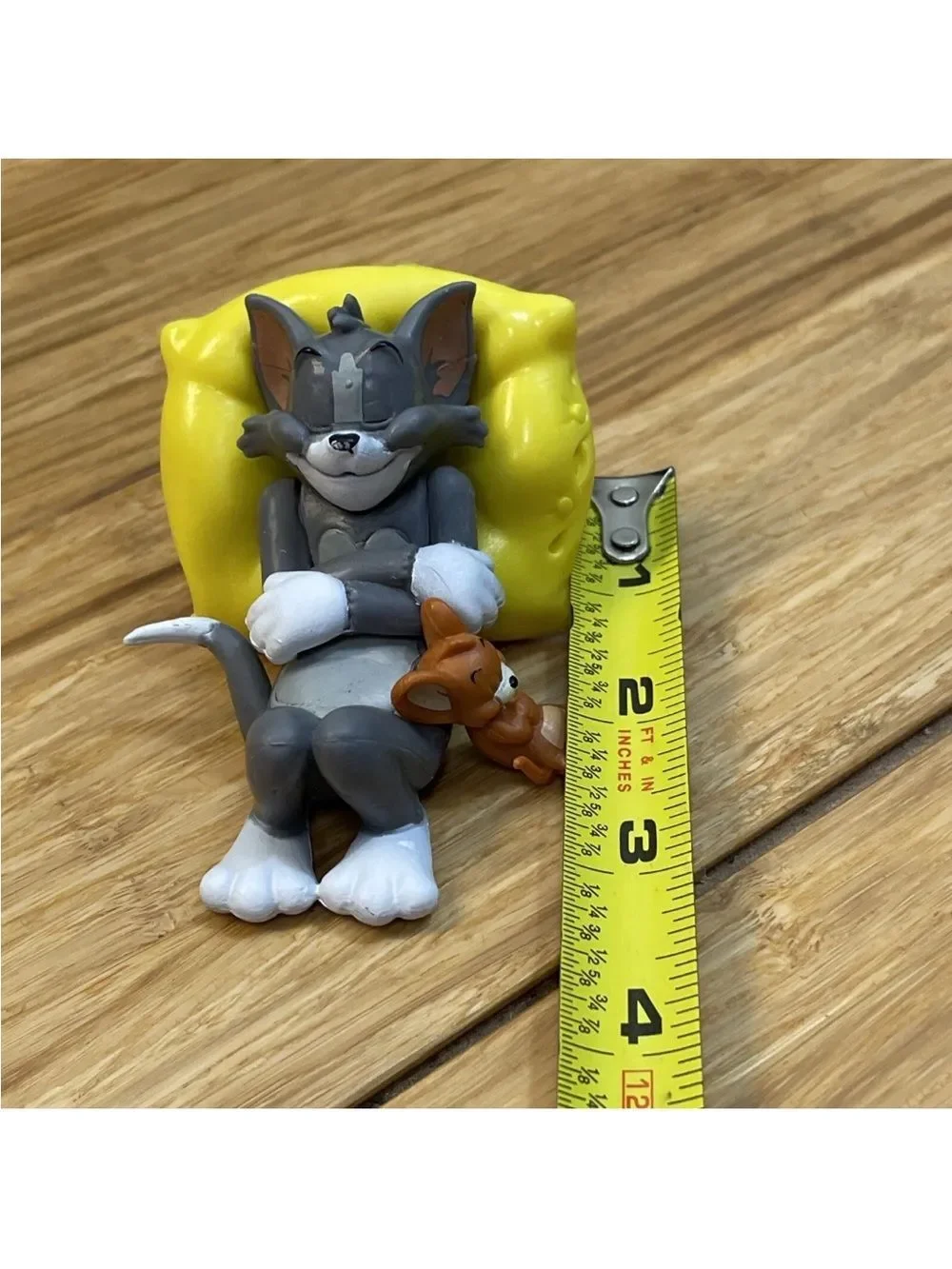Warner Bros. Gray Tom & Brown Jerry with Yellow Cheese Bed Figurine